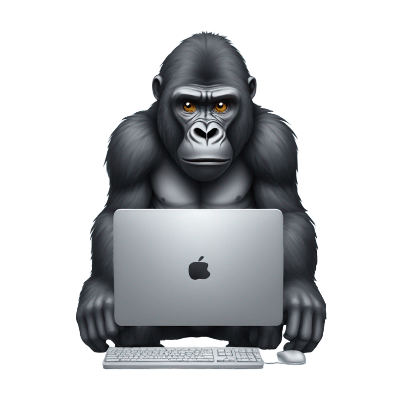 Gorilla typing on computer with a serious face